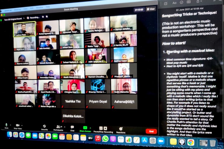 Students engrossed in song writing workshop