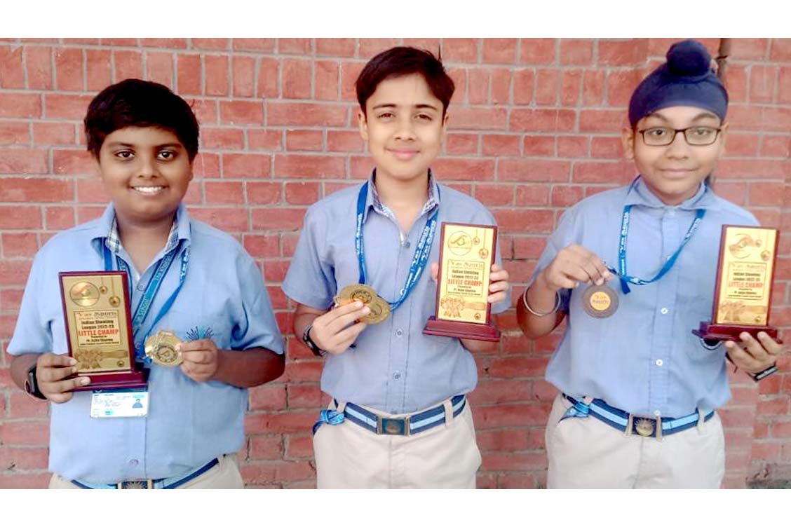 The middle school students with medals they won at Indian Shooting League