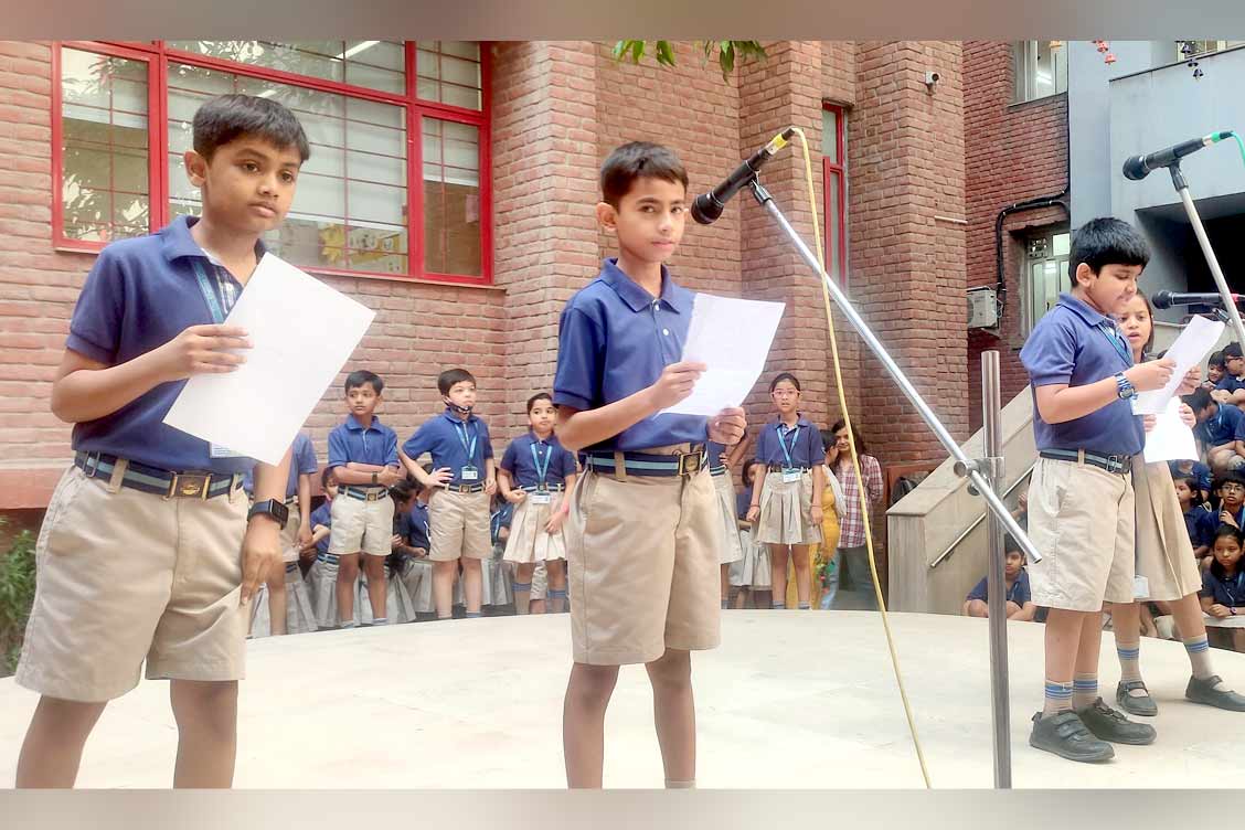 Class assembly 4A at TKS around the theme My School